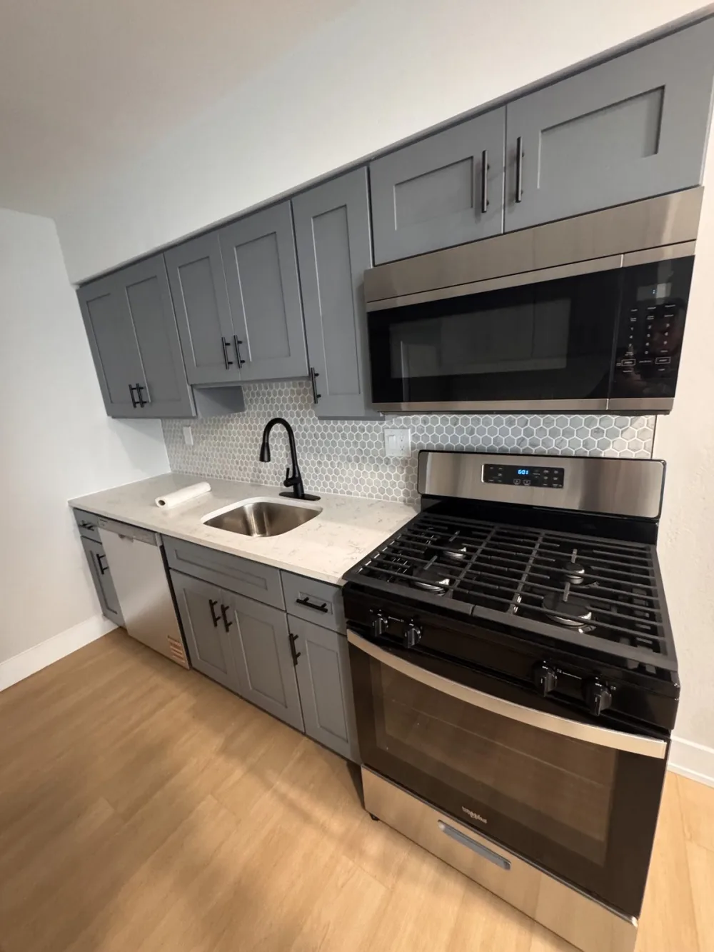 Gray top to bottom, kept light with white counters.
