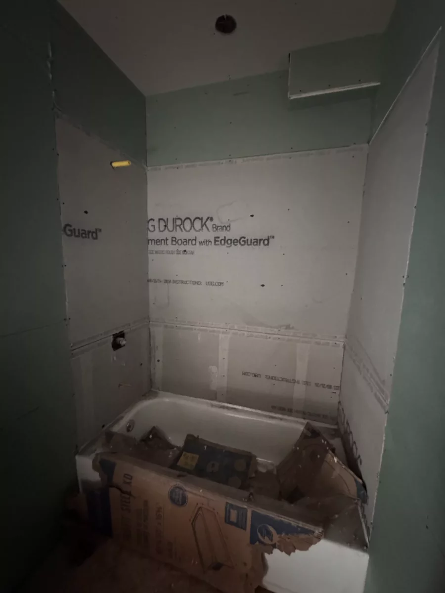 Tub alcove in cement board before tile during the bathroom remodel