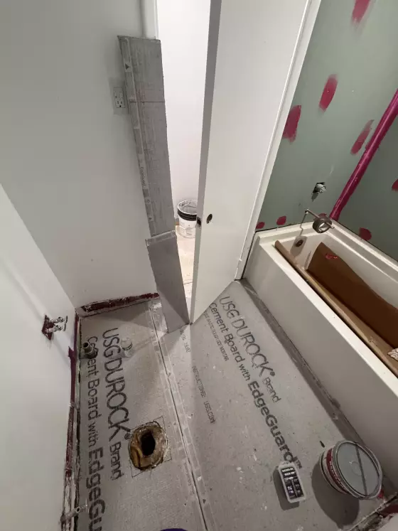 Bathroom floor and walls in cement board and waterproofing before tile