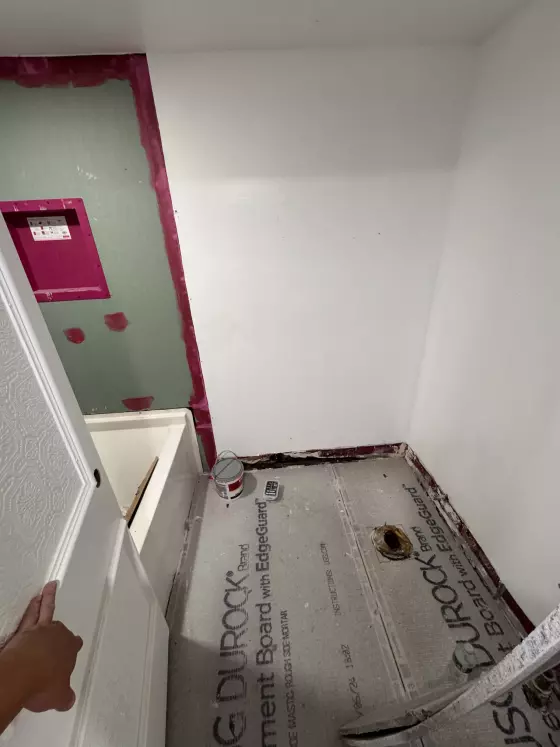 Tub alcove in cement board and waterproofing during the bathroom remodel