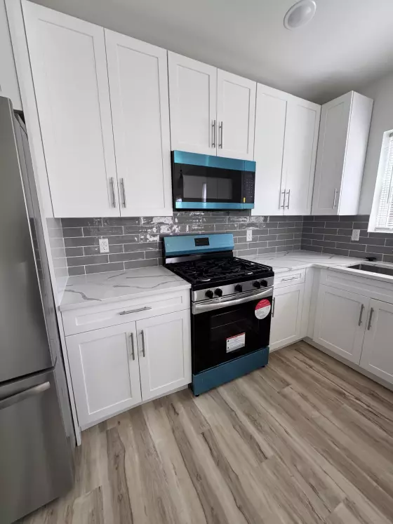 White Shaker Kitchen with Gray Subway Tile in Philadelphia, PA