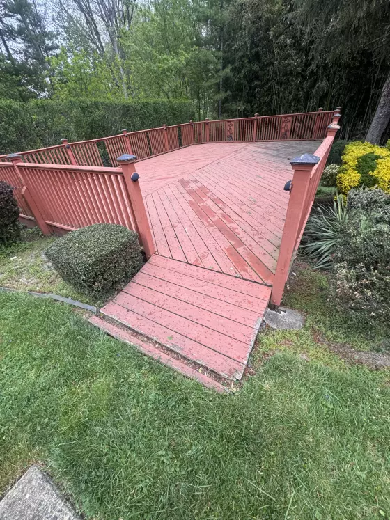 Old deck steps and ramp with peeling paint